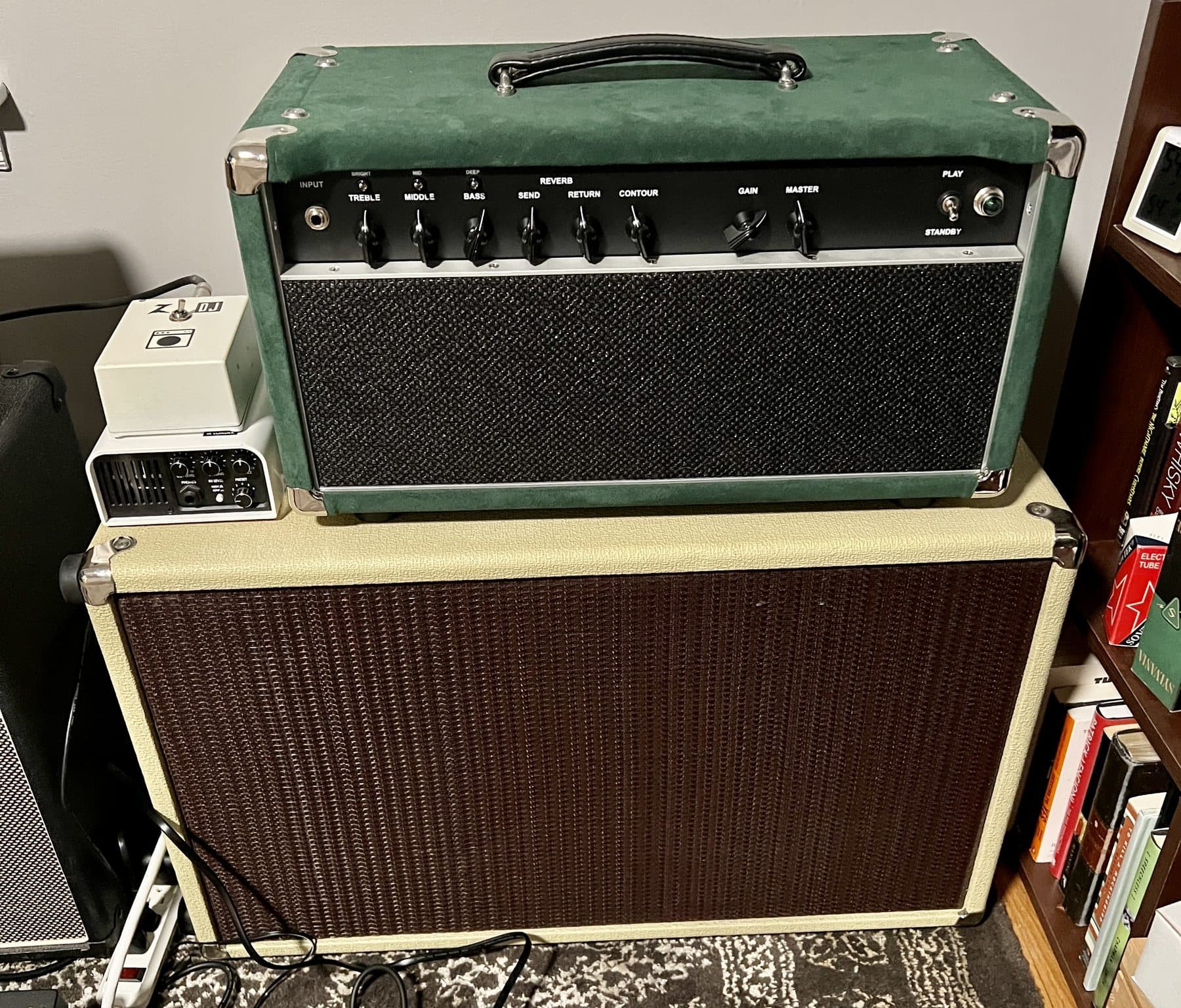Green suede head on a cream 2x12 cabinet